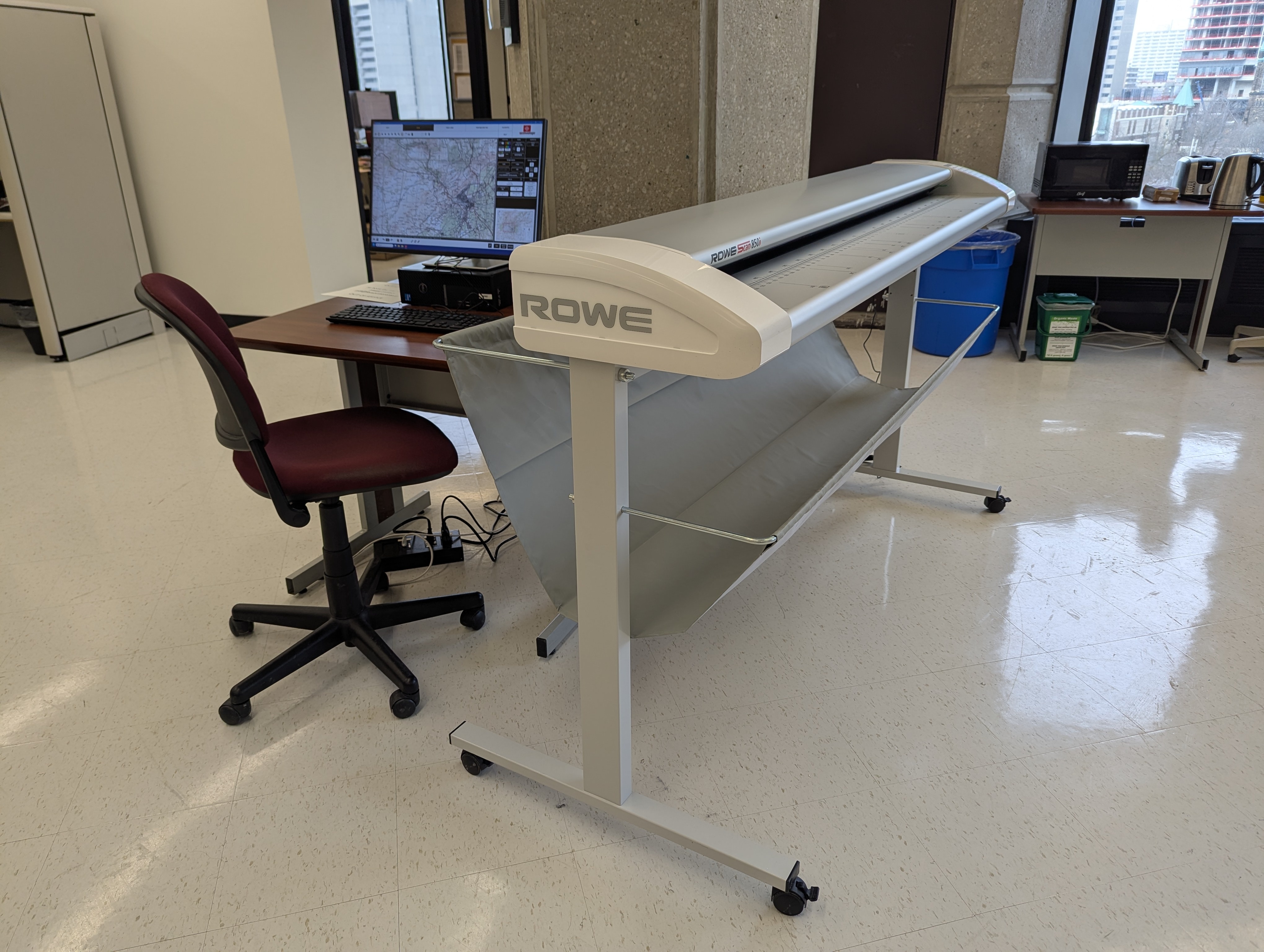 60 inch roll-feed scanner with basket