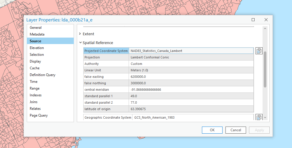 The properties window open, on the source tab with the projected coordinate system row highlighted